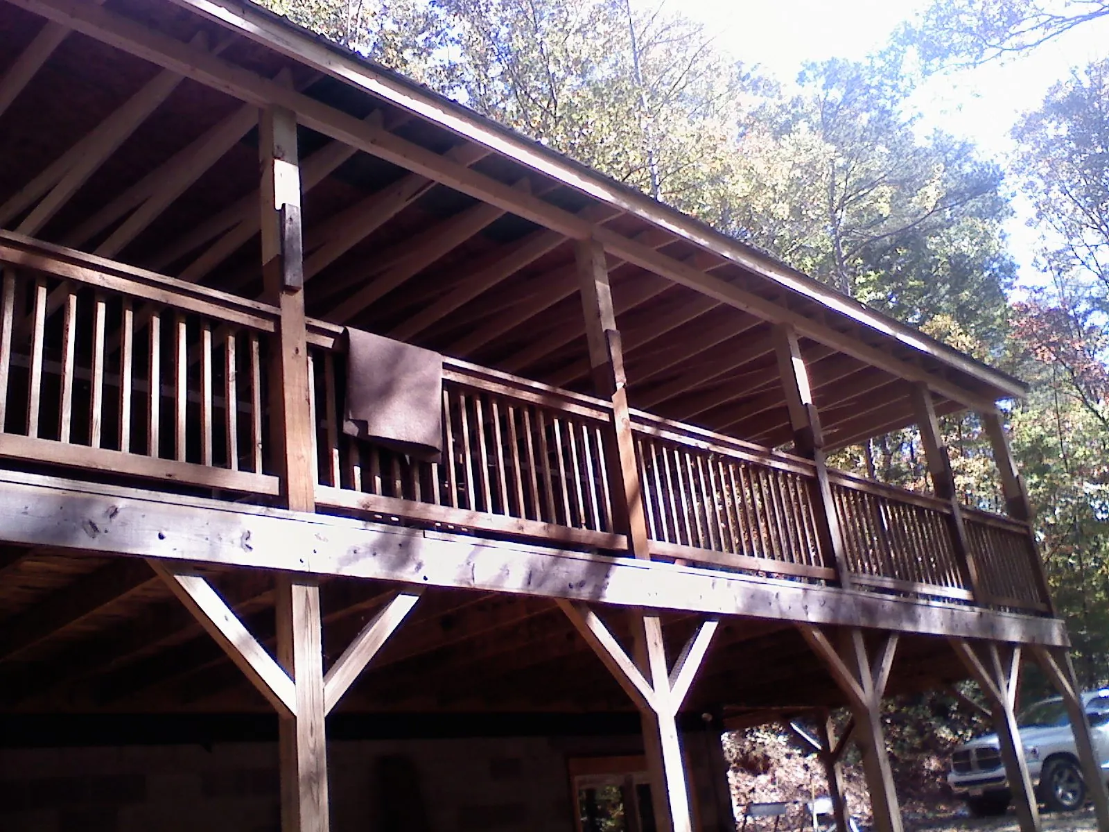 Timber framing under a new elevated porch and deck — Roof Leak Repair in Sugarcreek by Roofing Brothers